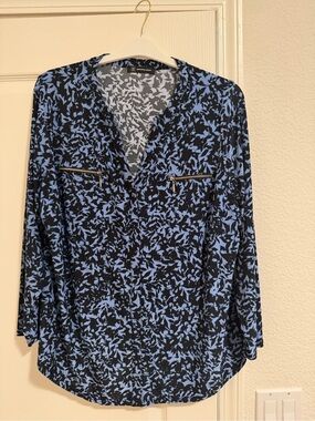 INC 2X blouse — blue/black leaf print, long sleeve with silver zipper details.